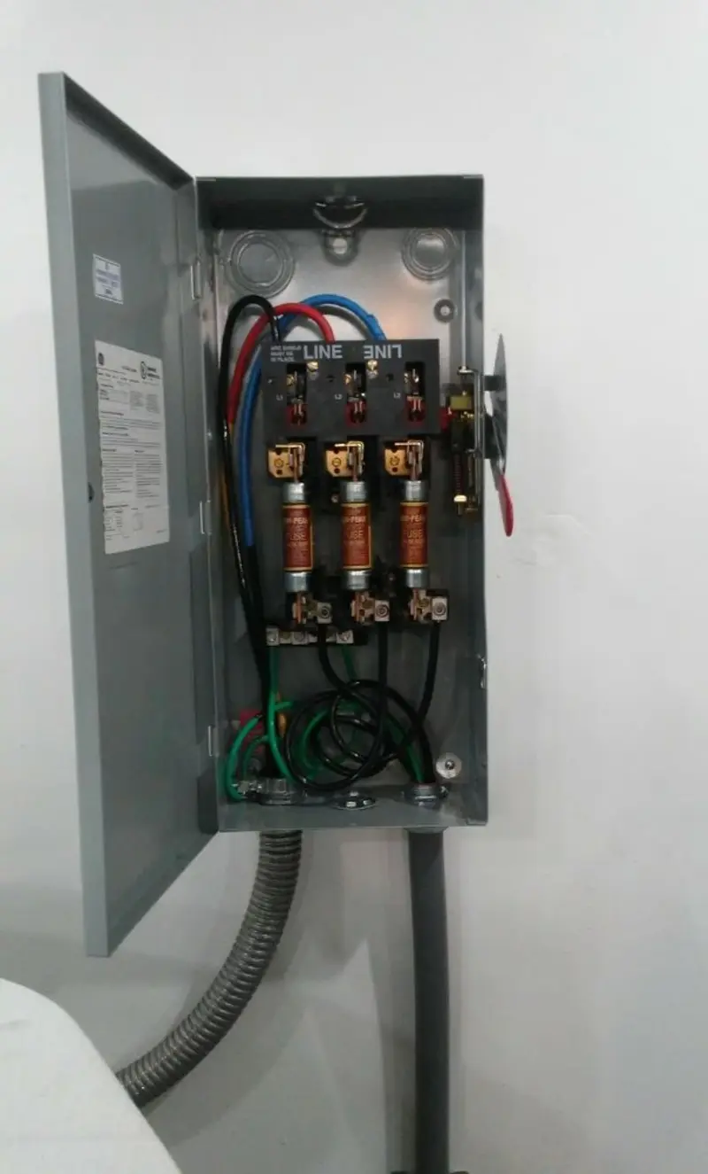 Three-phase disconnect switch installed for Smoke Detector Installation in Larose