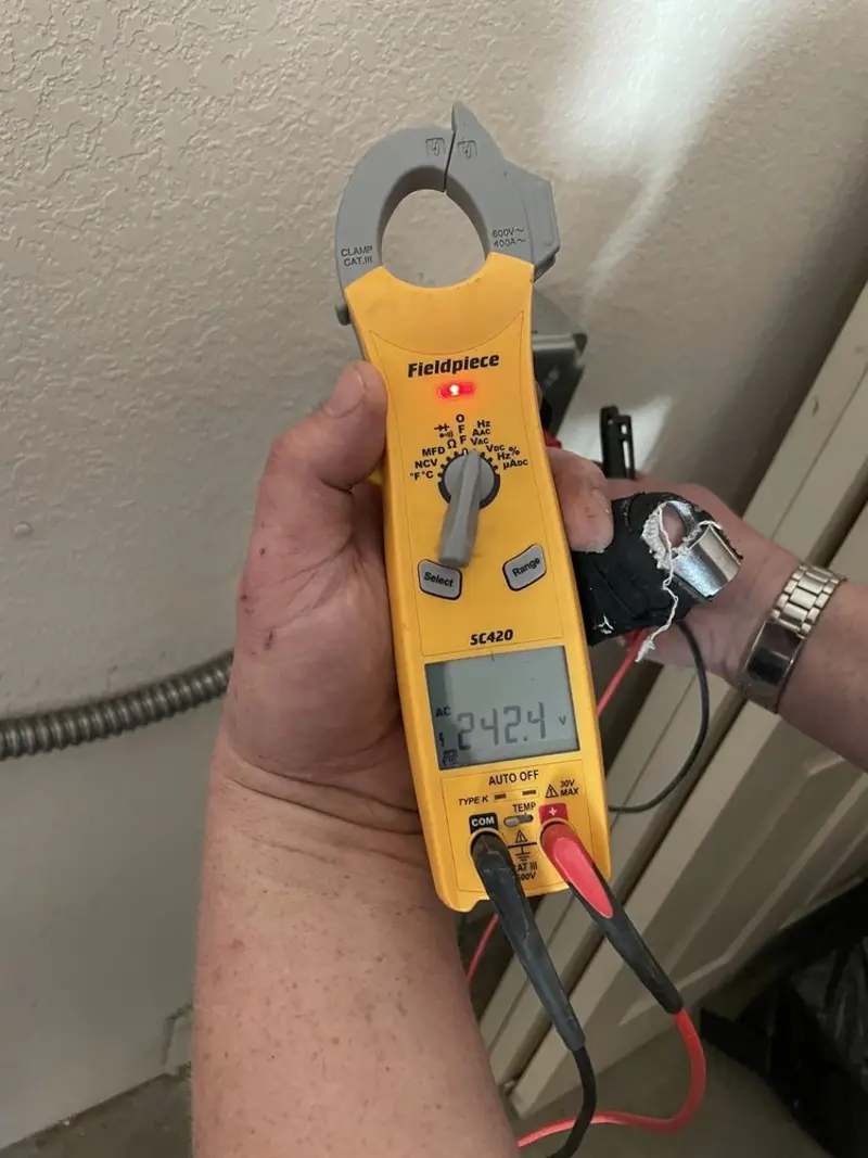 Voltage testing with clamp meter during Aluminum Wiring Replacement in Larose